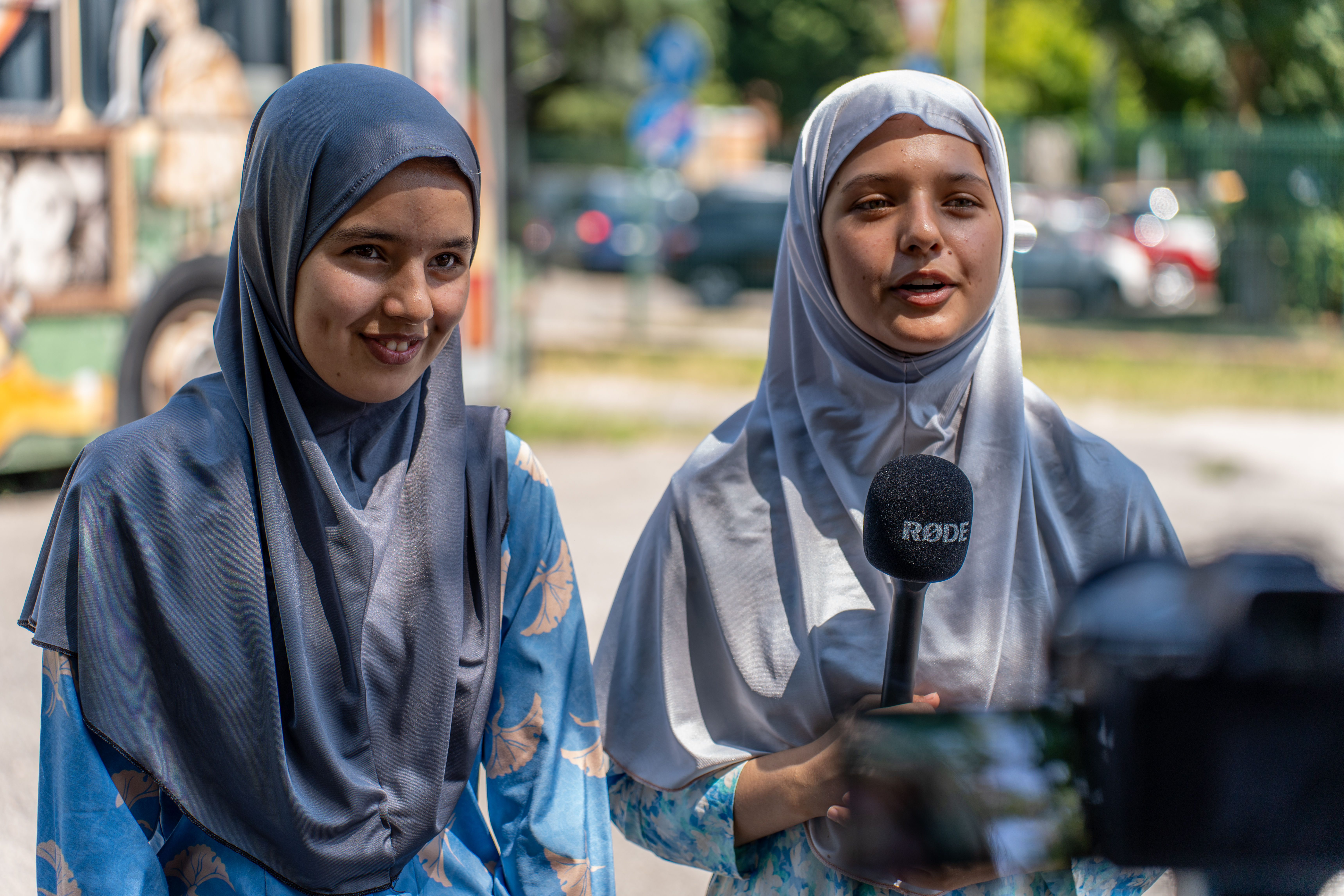 Afghan girls with camera and microphone